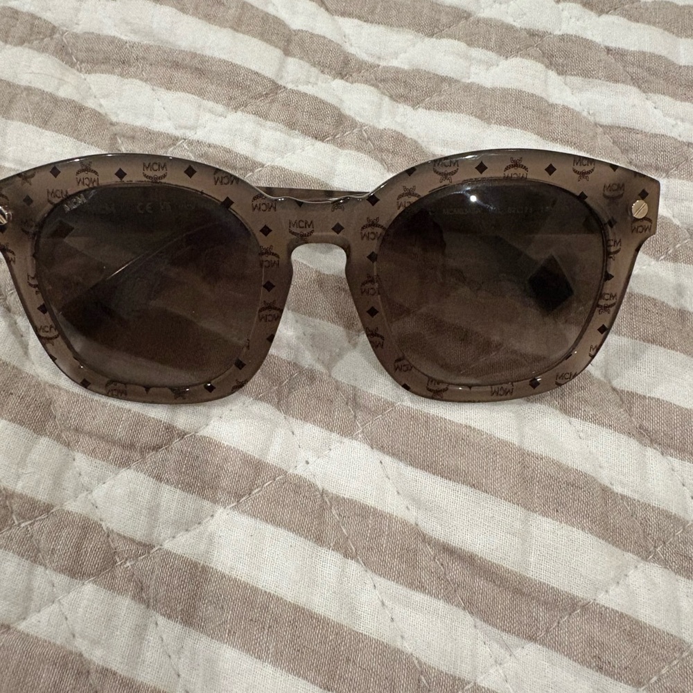 EUC MCM sunglasses. Comes with case, cards and cleaning cloth